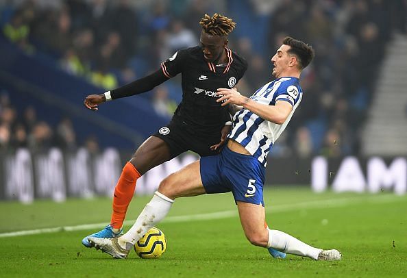 Brighton & Hove Albion's Dunk in action against his apparent suitors